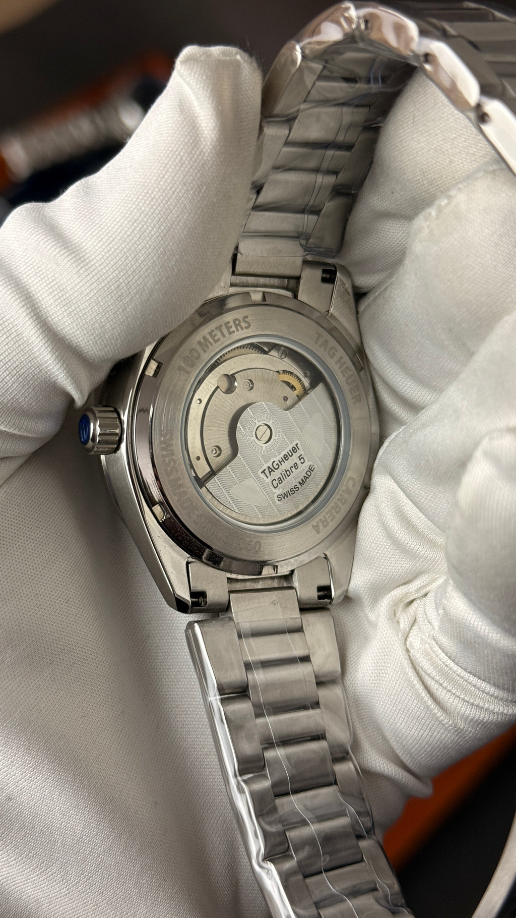 Silver with blue Dial