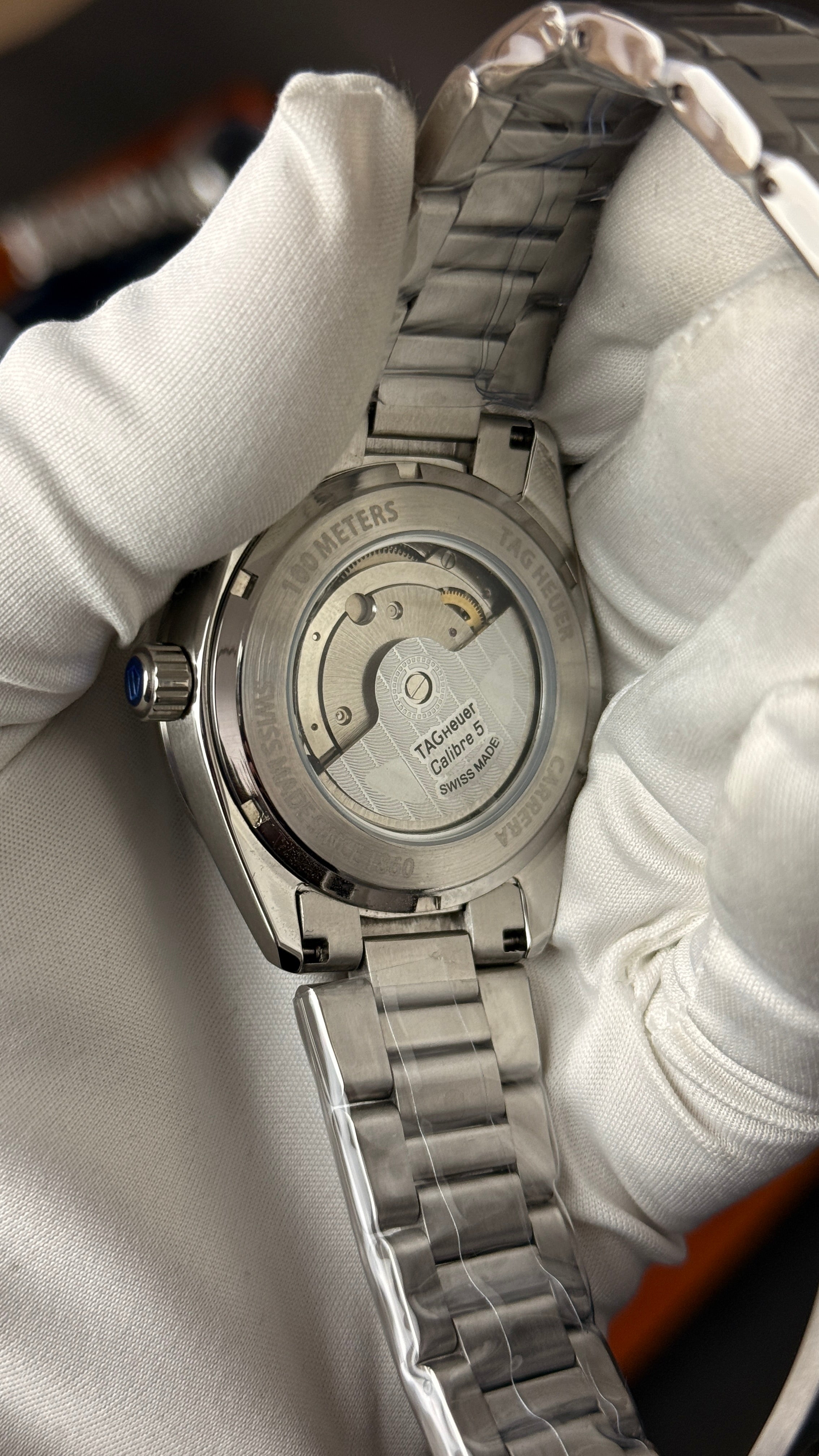 Silver with blue Dial