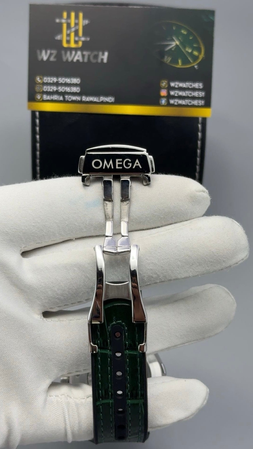 Silver with Green Dial.