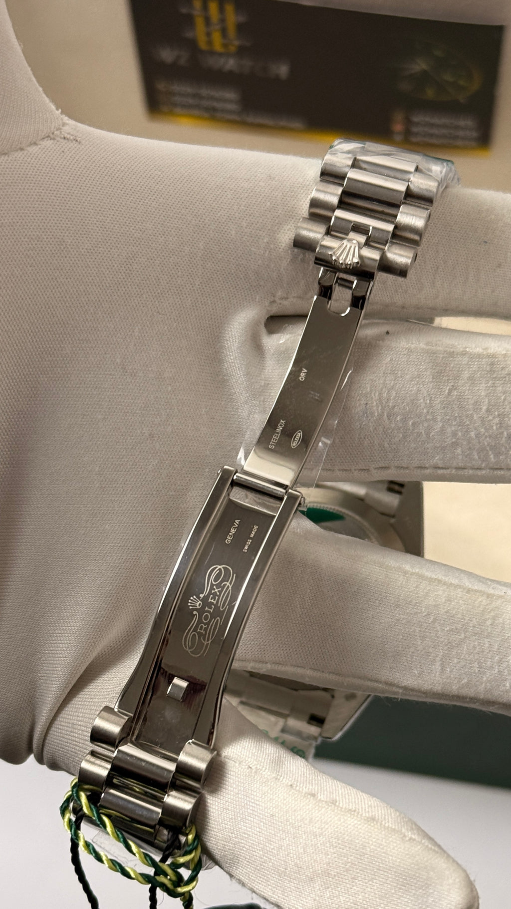 Silver with green Dial.
