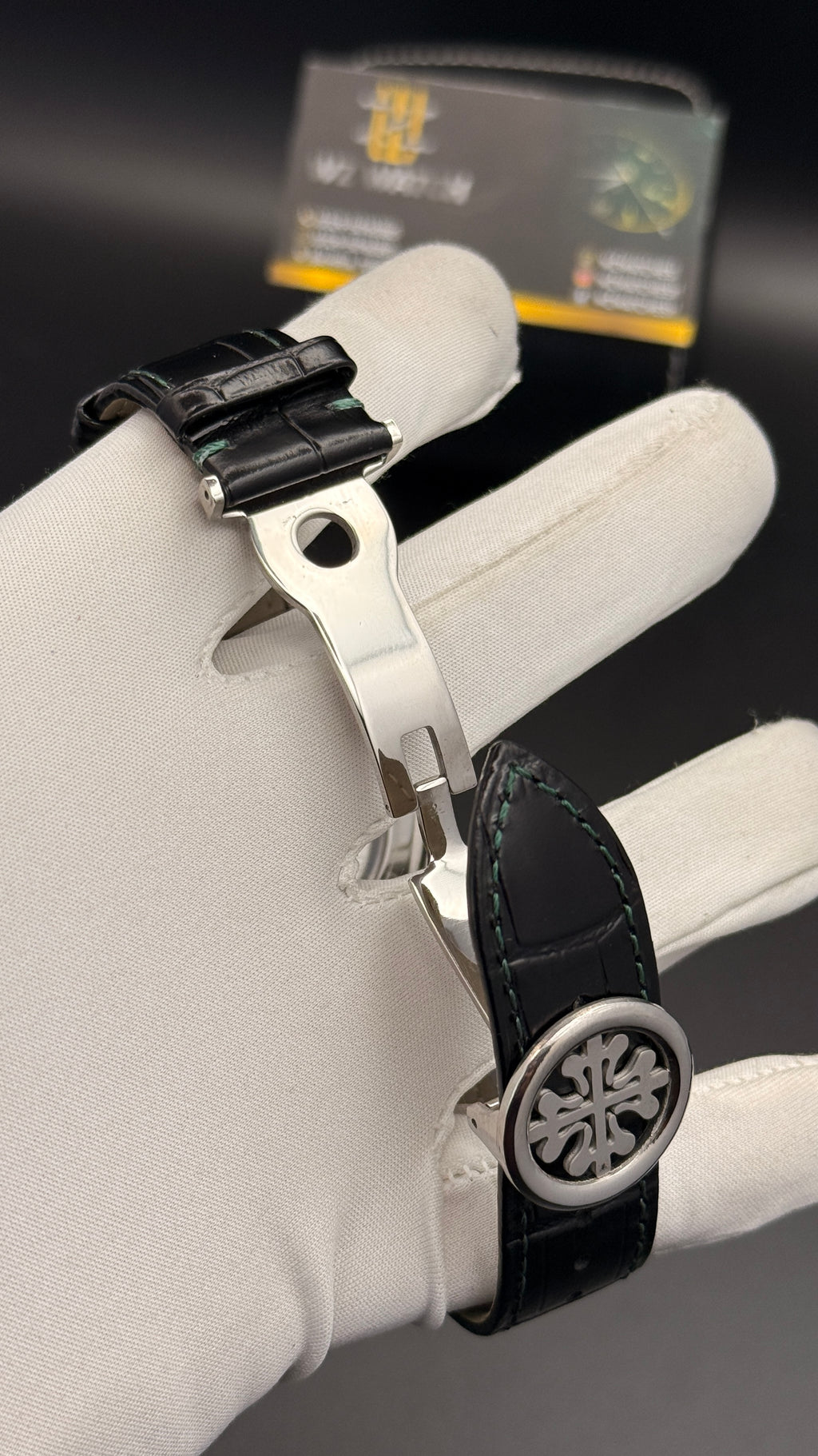 Silver with green Dial.