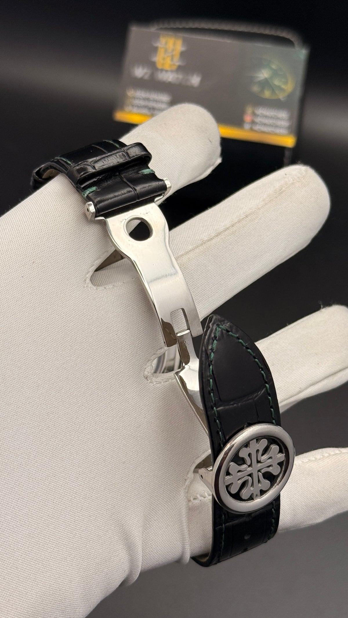 Silver with green Dial.