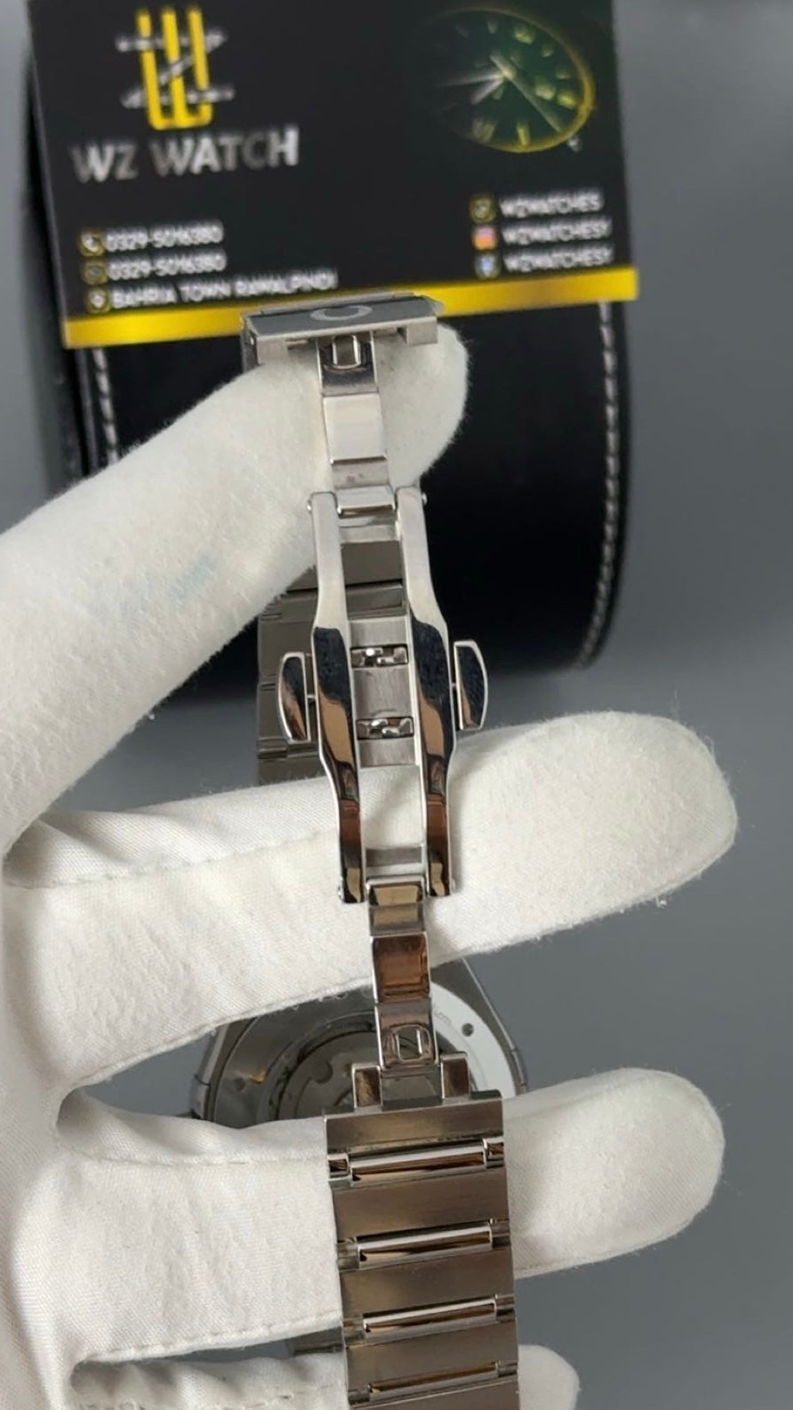 Silver with white Dial.