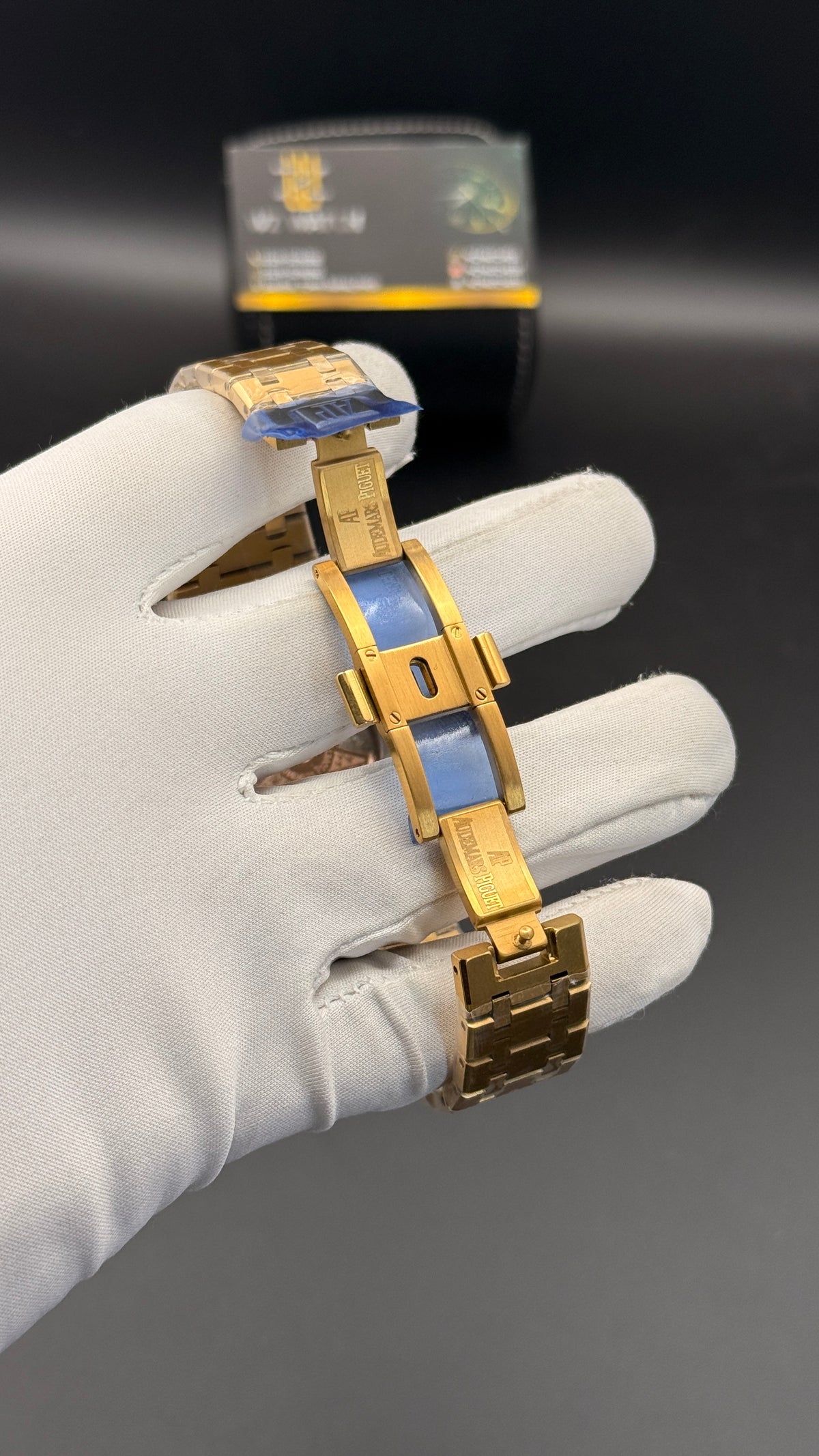 Yellow gold with black Dial.