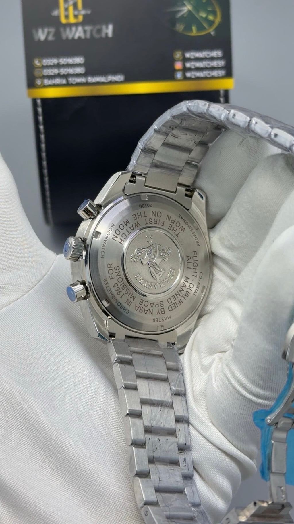 Silver with green Dial.