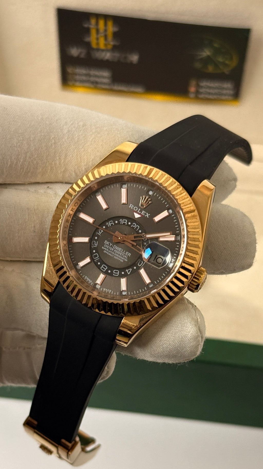 Rose gold with  Dark grey Dial.