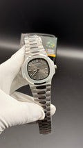 Silver with grey Dial.