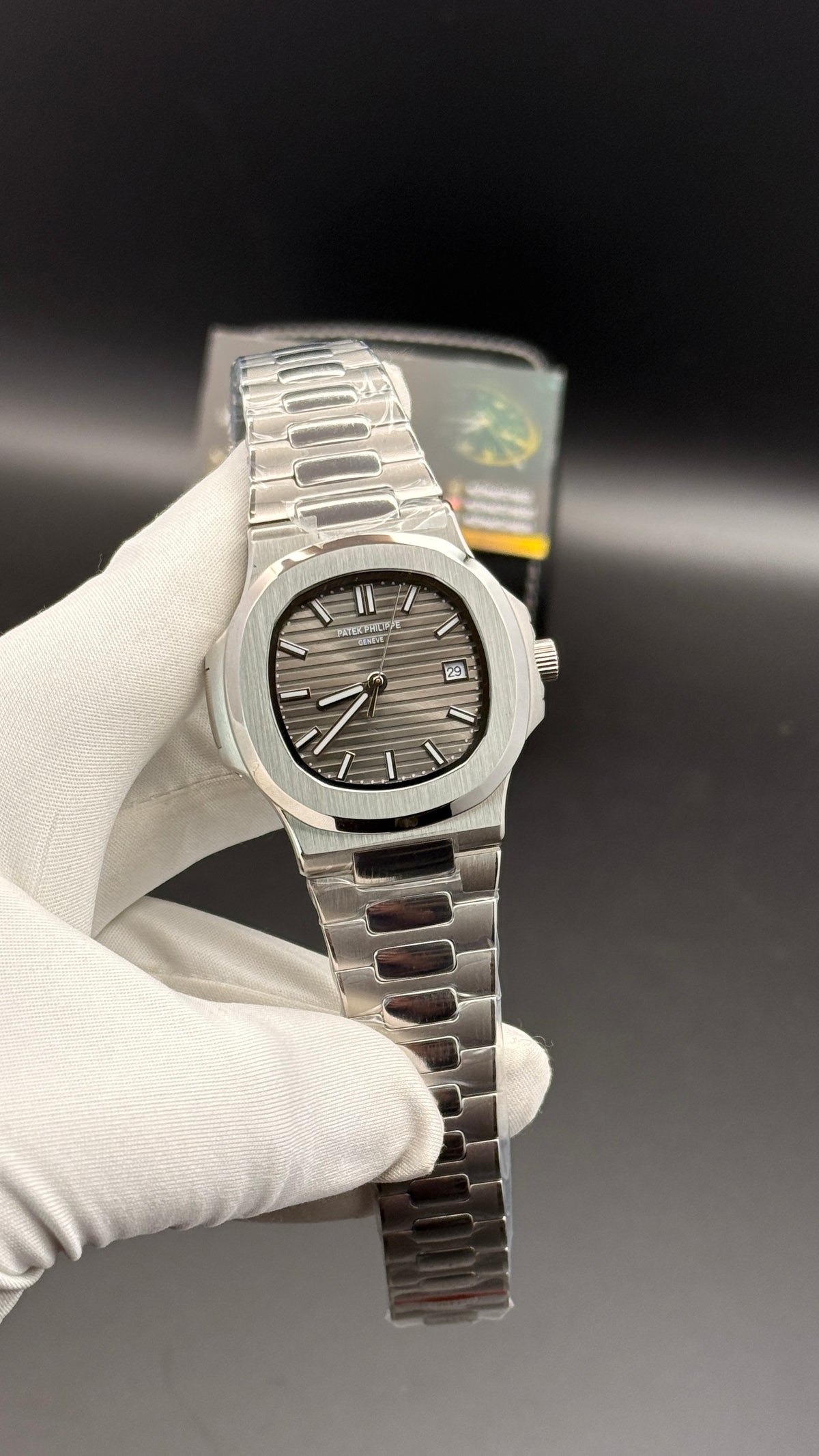 Silver with grey Dial.