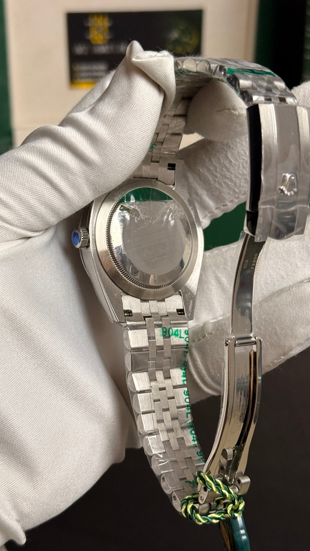Silver with blue Dial.