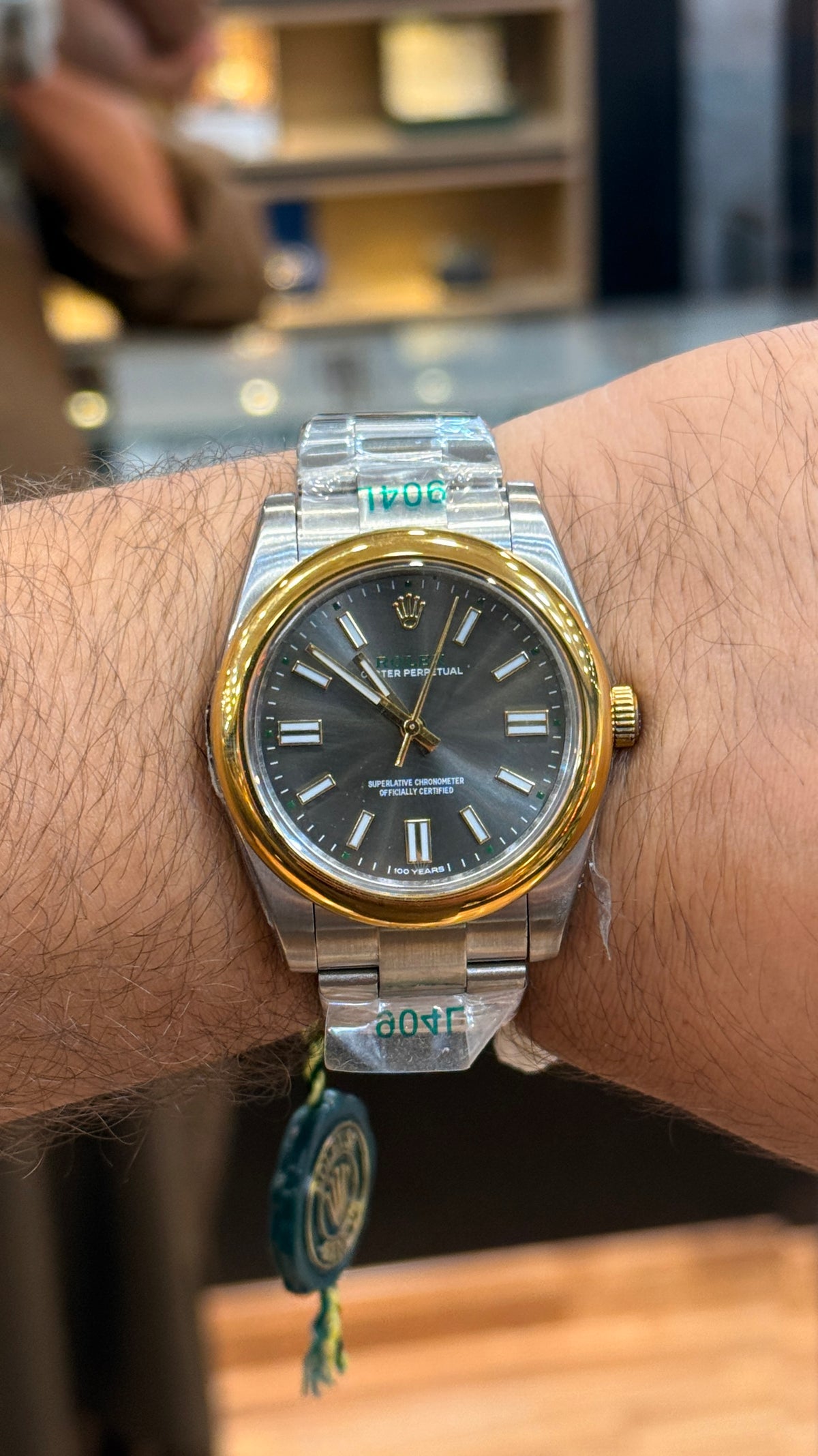 Silver with gray Dial.