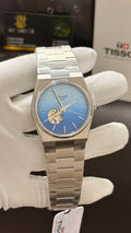 Silver with blue dial