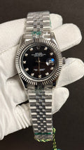Silver with black Dial.