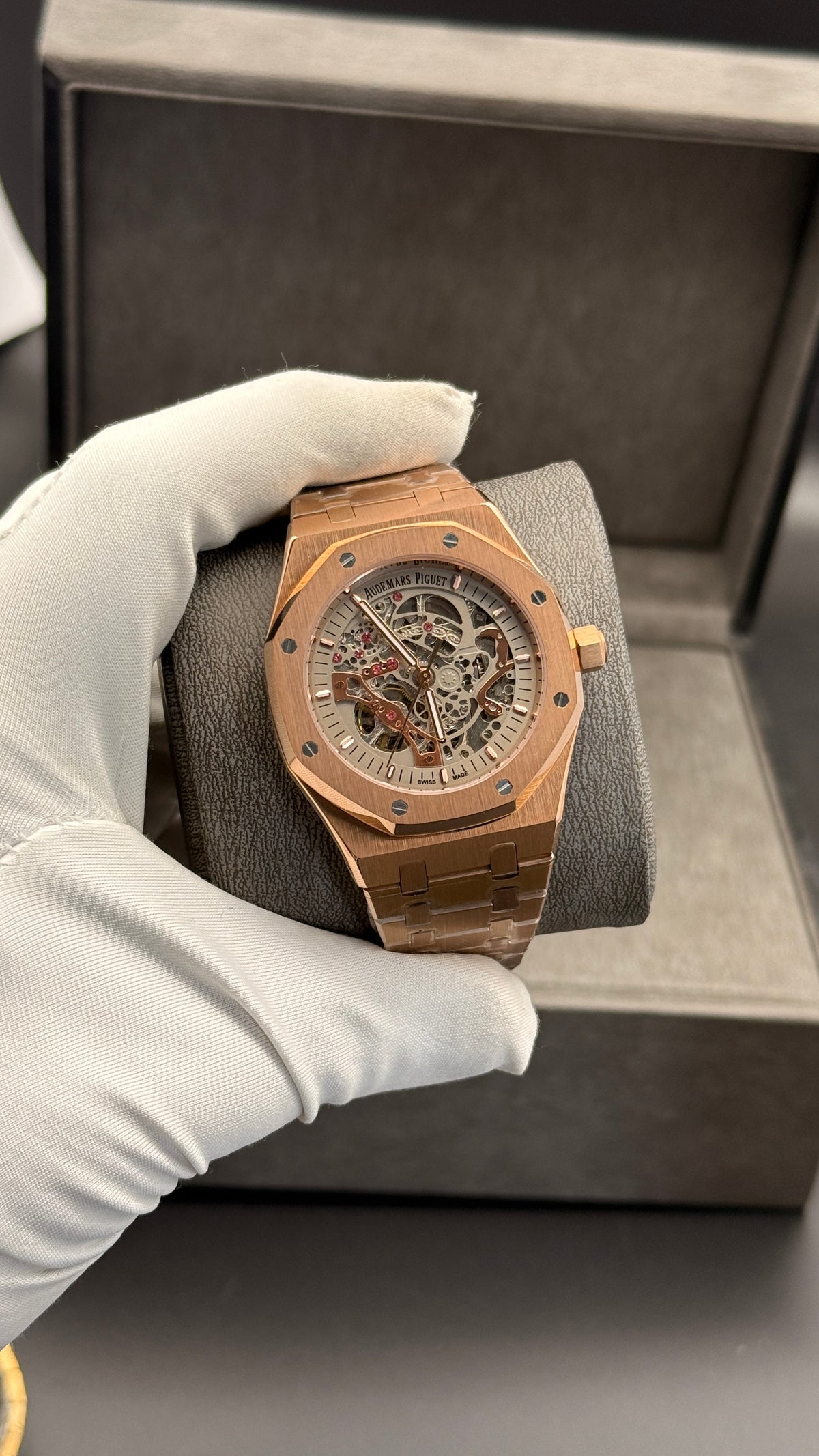 Rose gold with white  skeleton Dial.