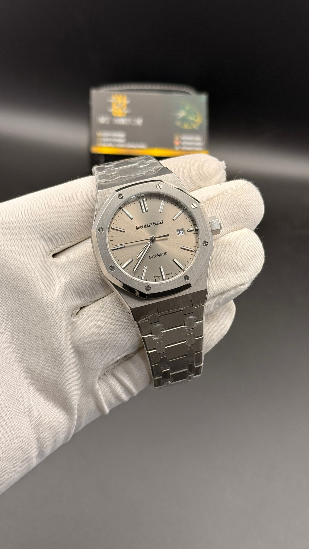 Silver with grey Dial.