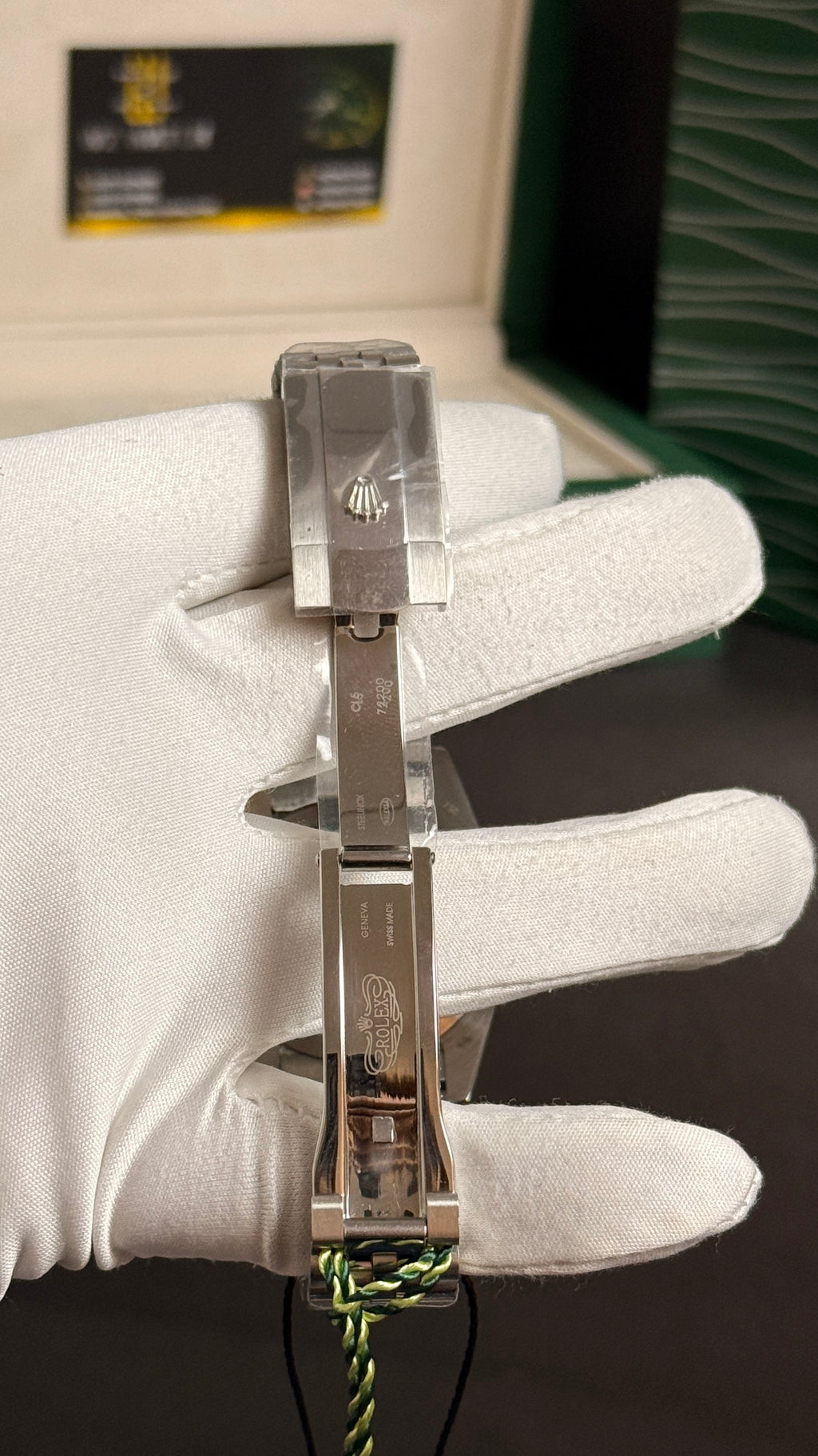 Silver with green Dial.