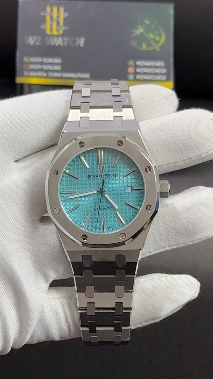 Silver with Tiffany blue dial