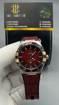 Silver with Maroon Dial.