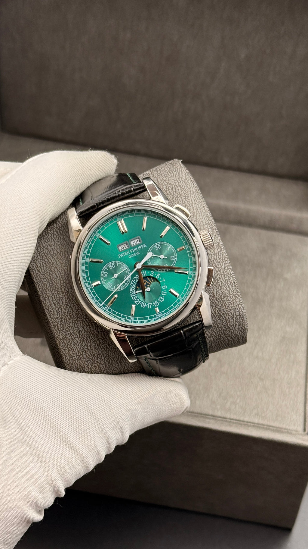 Silver with green Dial.