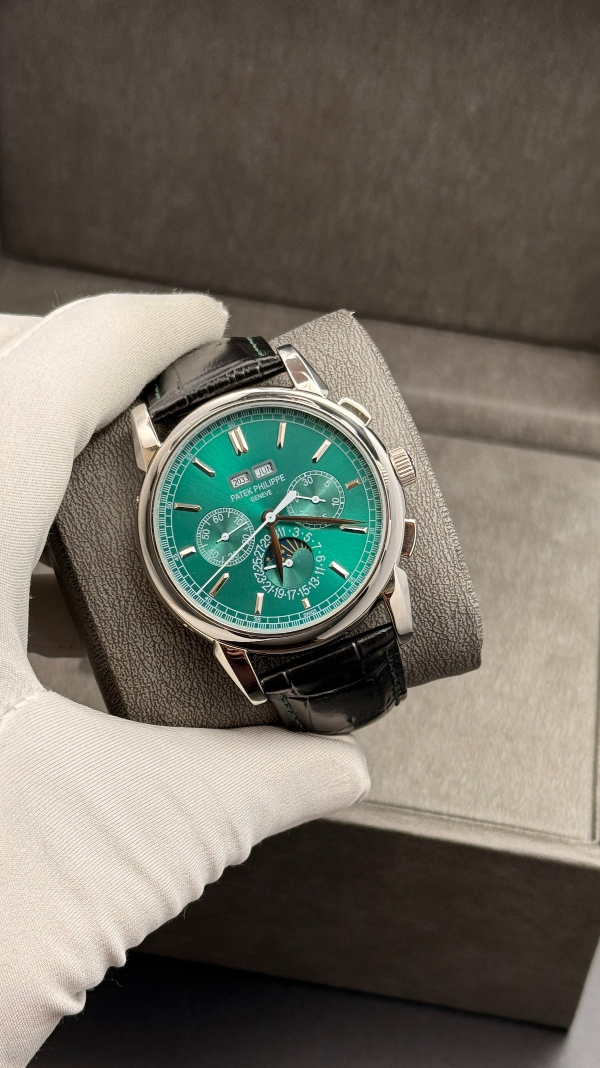 Silver with green Dial.