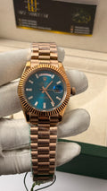Rose Gold with  Apue Dial.