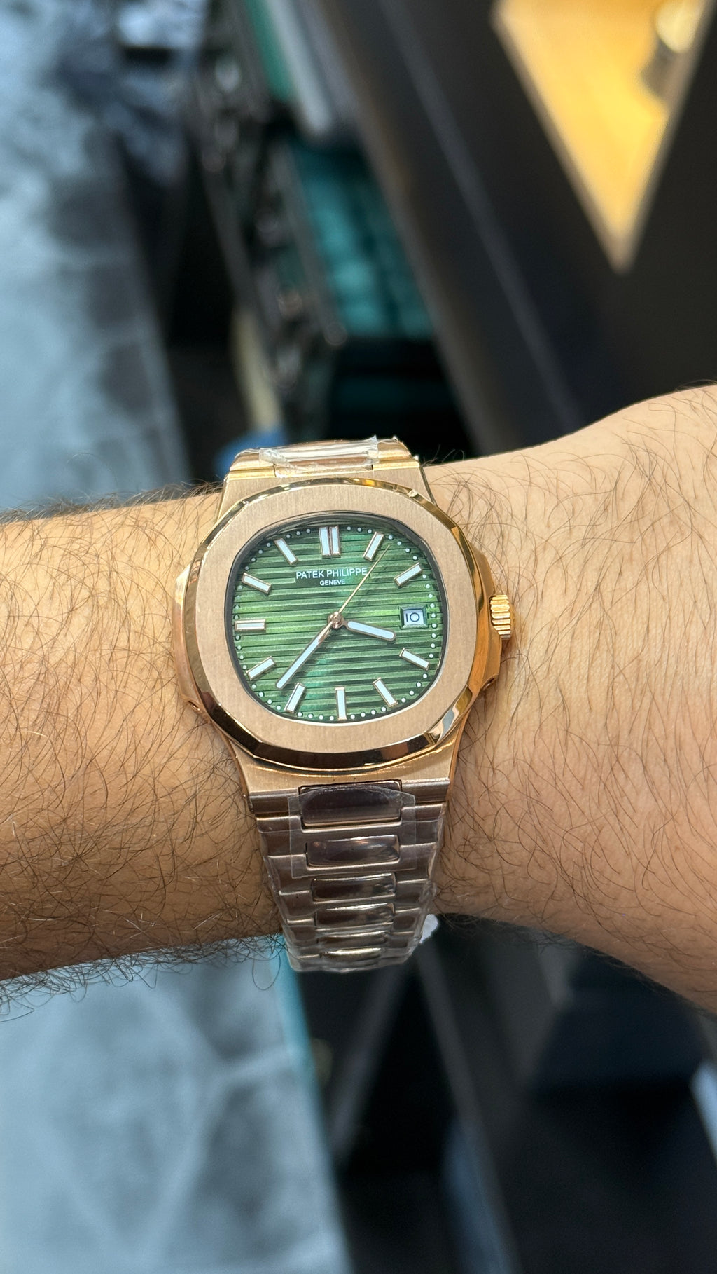 Rose gold with green Dial.
