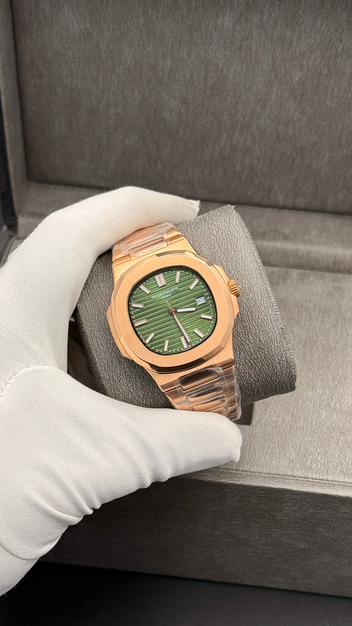 Rose gold with green Dial.