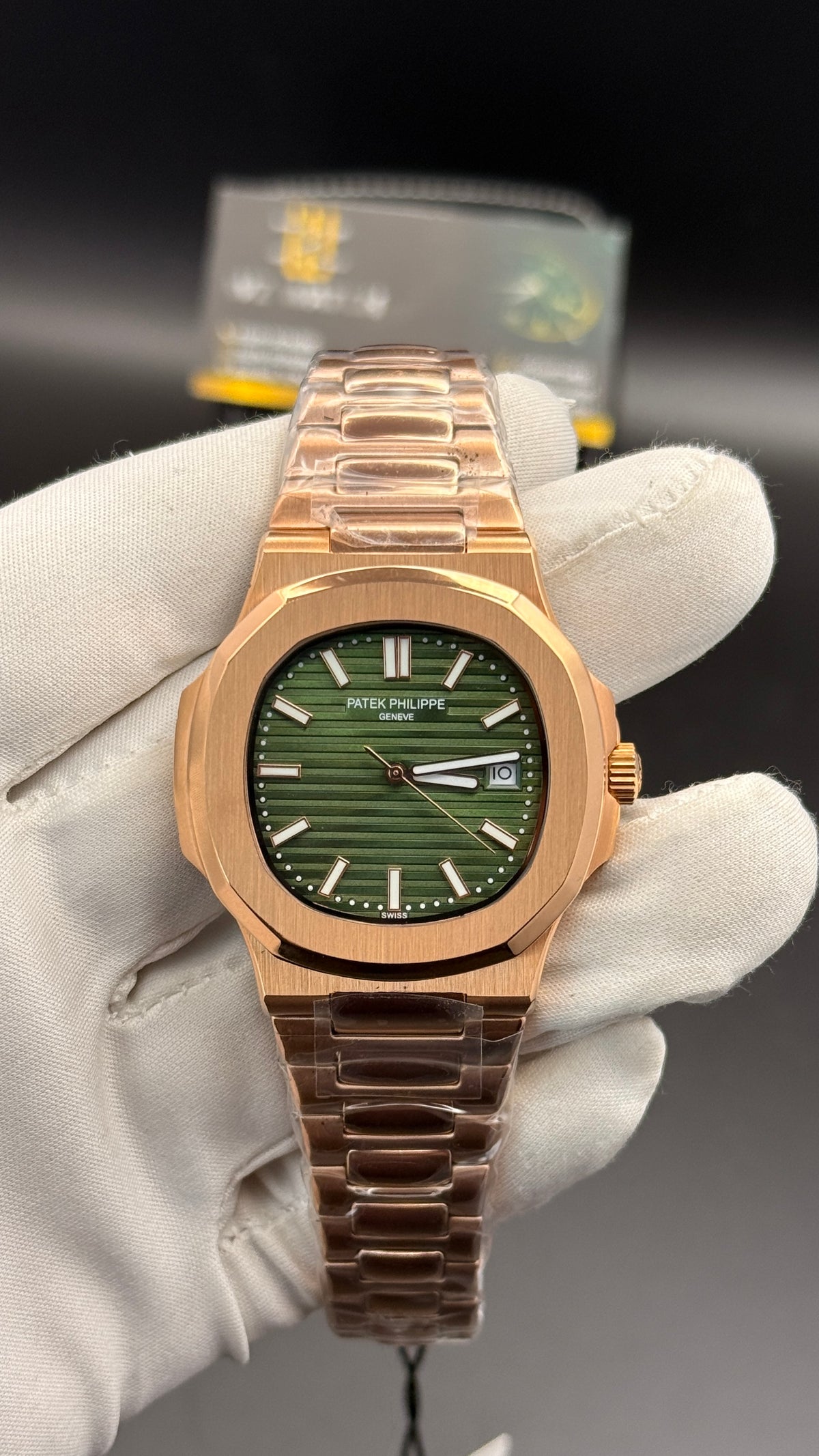 Rose gold with green Dial.