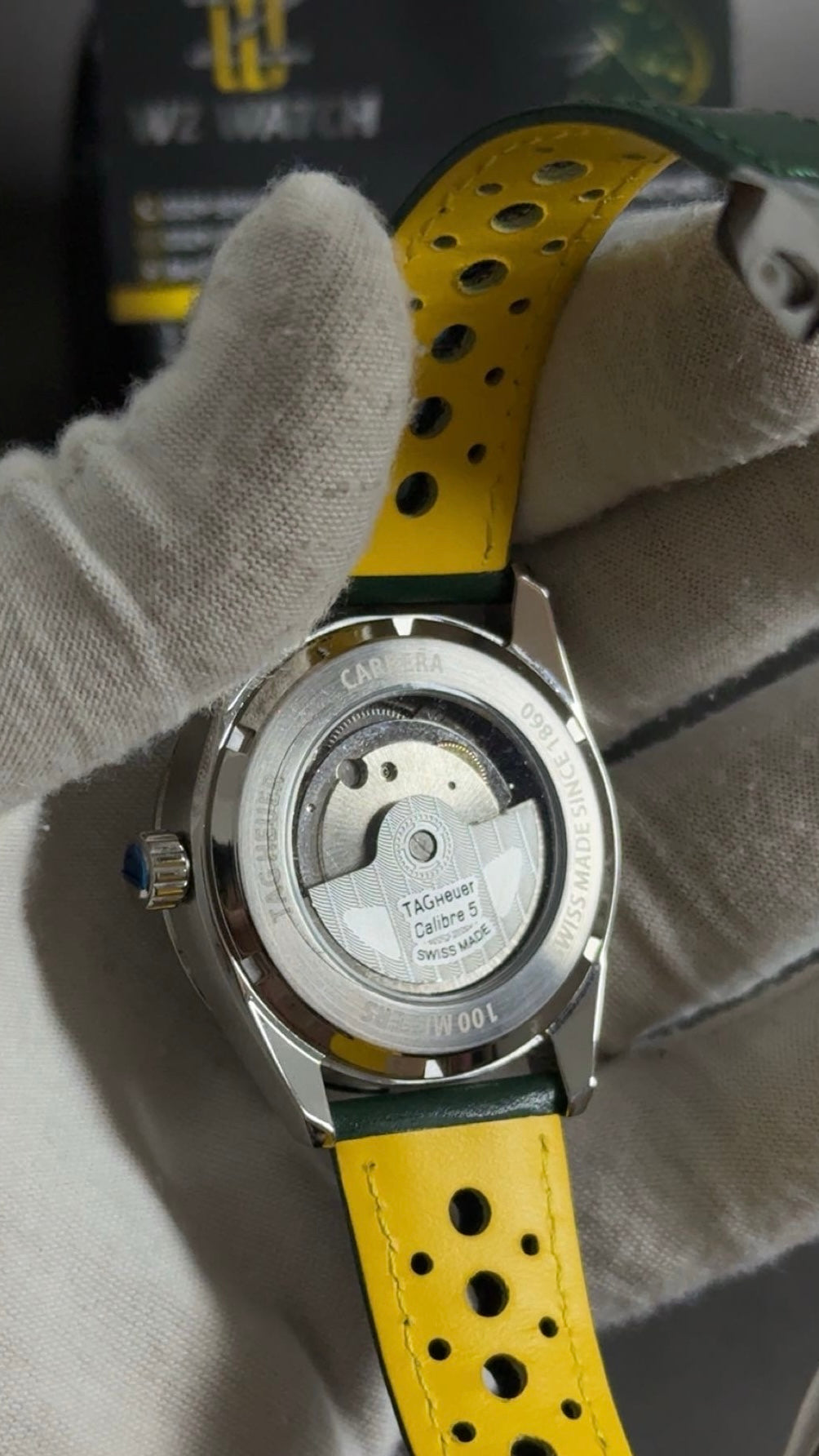 Silver with green Dial