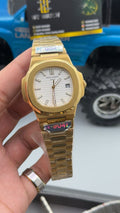 Gold with white Dial.