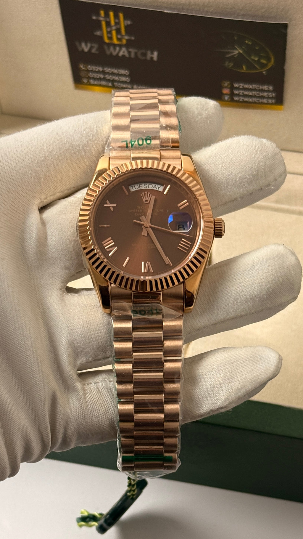 Rose gold with chocolate Dial.