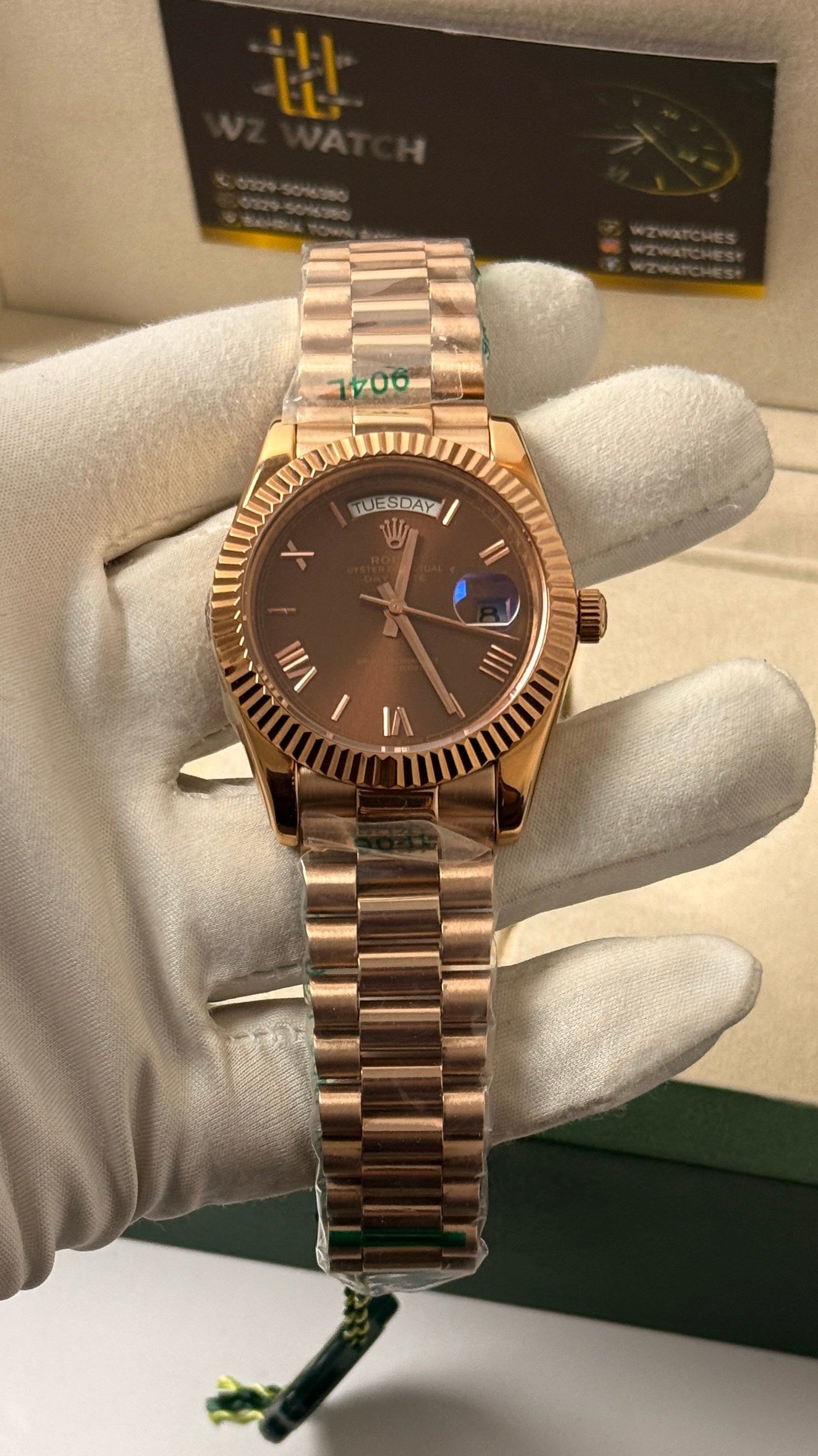 Rose gold with chocolate Dial.