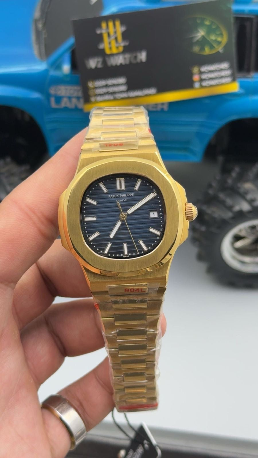 Gold with blue Dial.