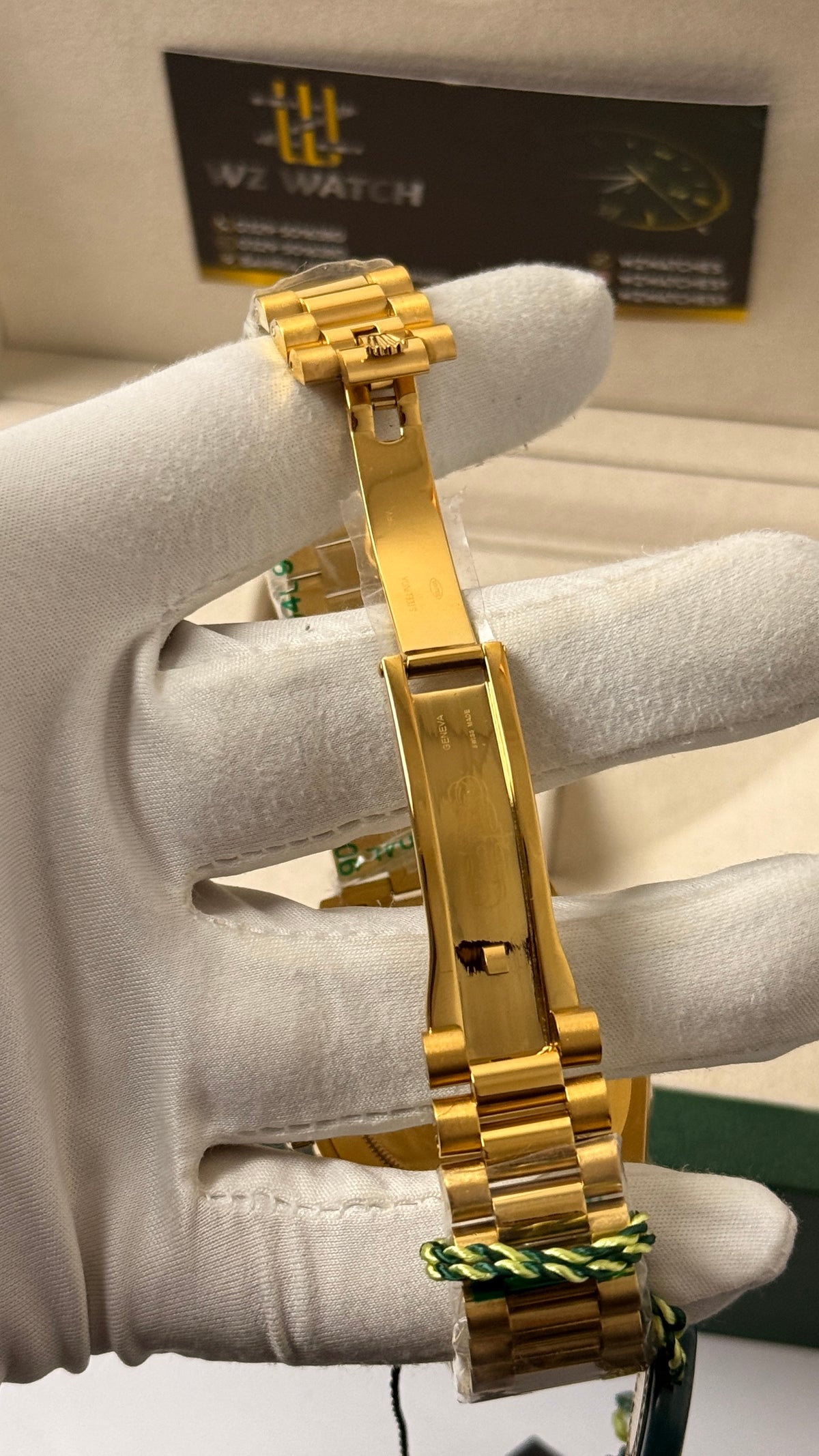 Yellow Gold with  Green Dial.