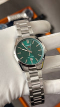 Silver with green Dial