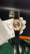 Rose gold with gray Dial.