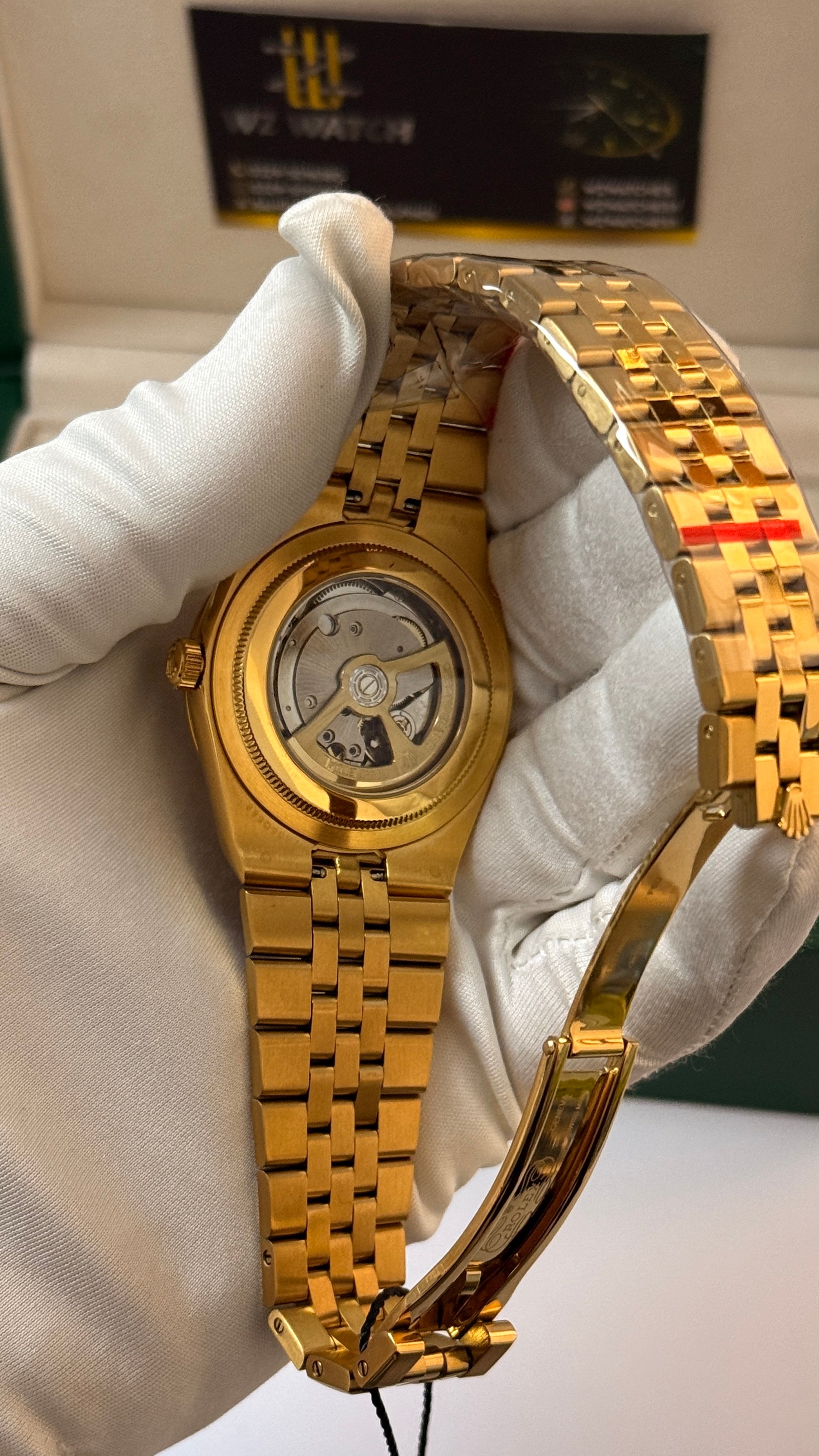 Yellow gold with white Dial.