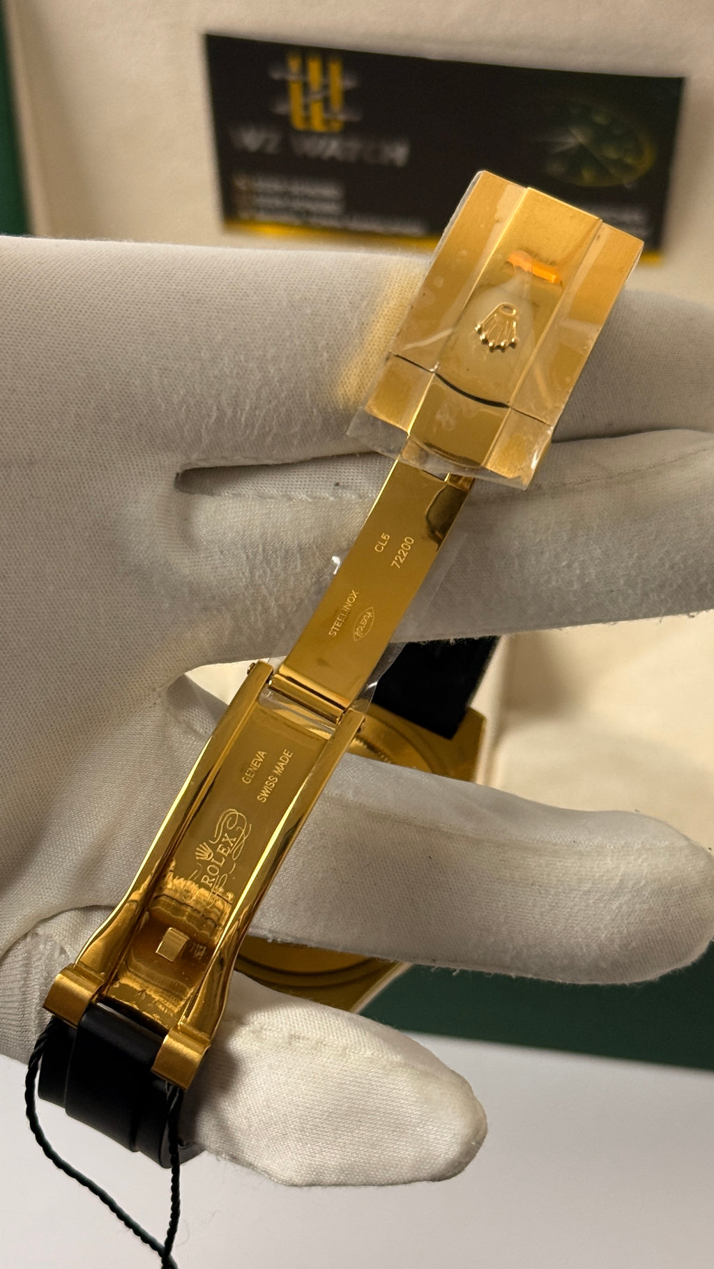 Yellow gold with black Dial.