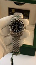 Silver with black Dial.