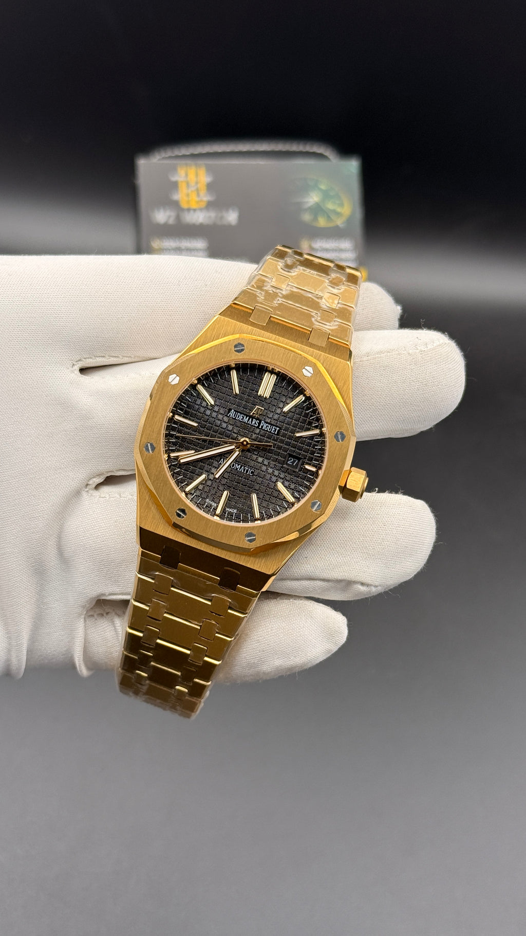 Yellow gold with black Dial.