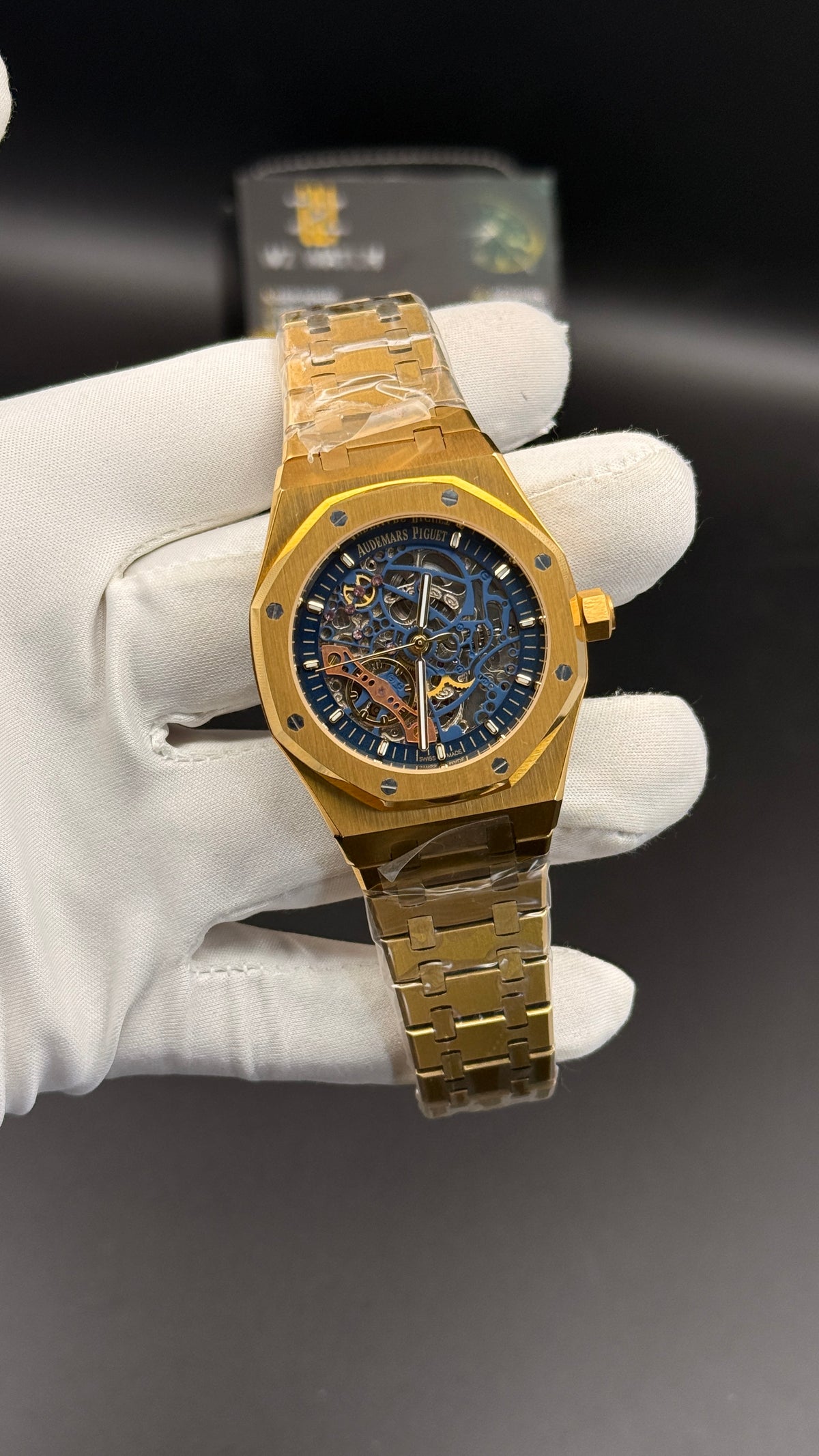 Yellow gold with blue skeleton Dial.