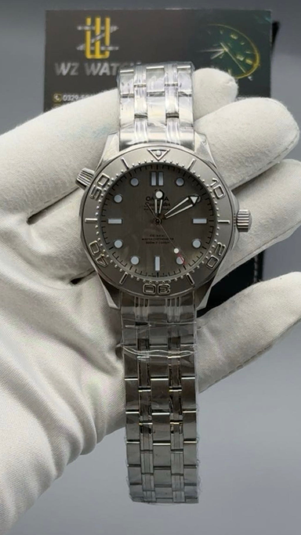 Silver with Dark Grey Dial.