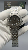 Silver with Dark Grey Dial.