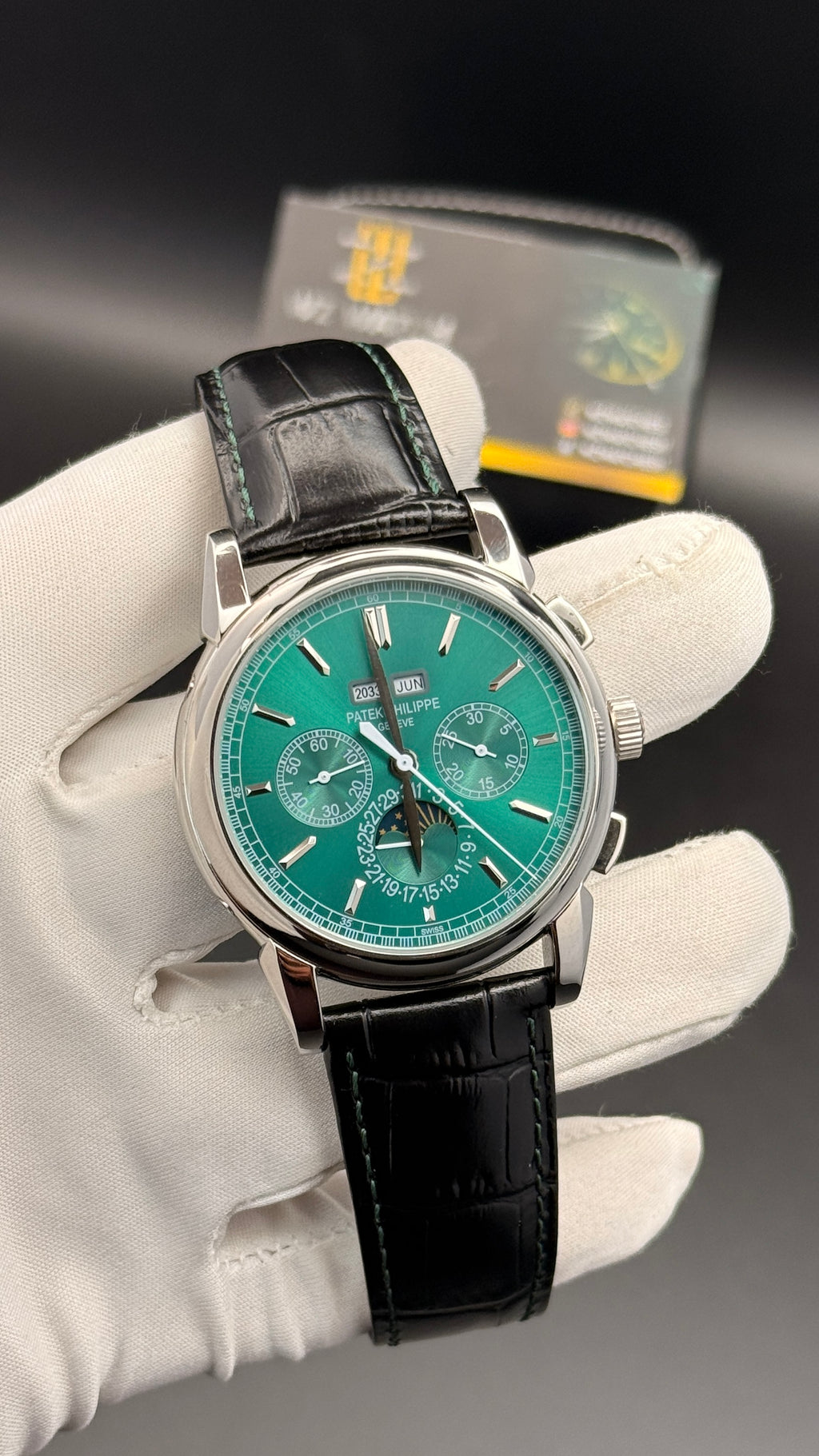 Silver with green Dial.