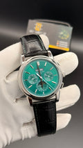 Silver with green Dial.