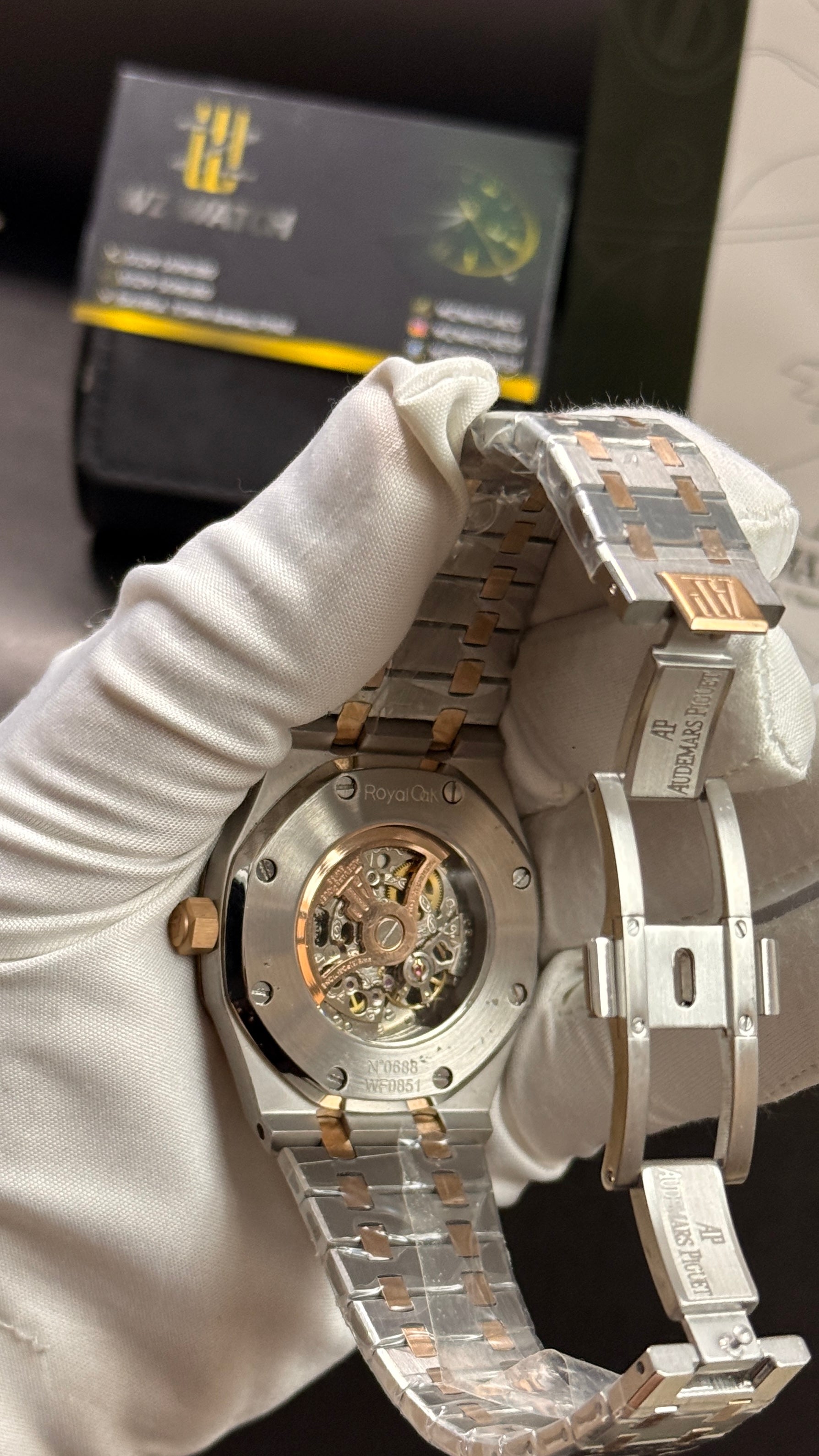 Rose gold two tone with blue skeleton dial
