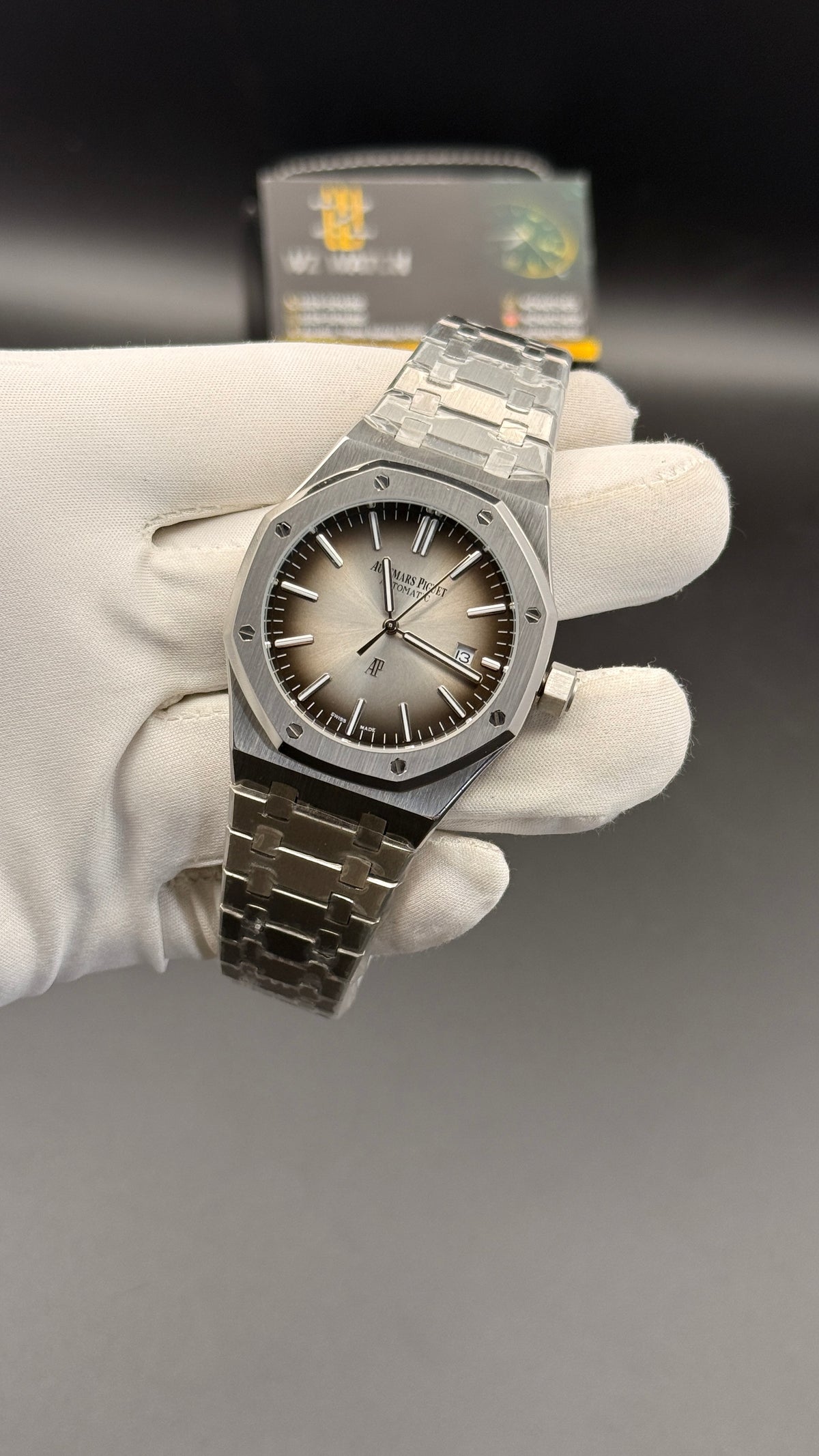 Silver with grey Dial.