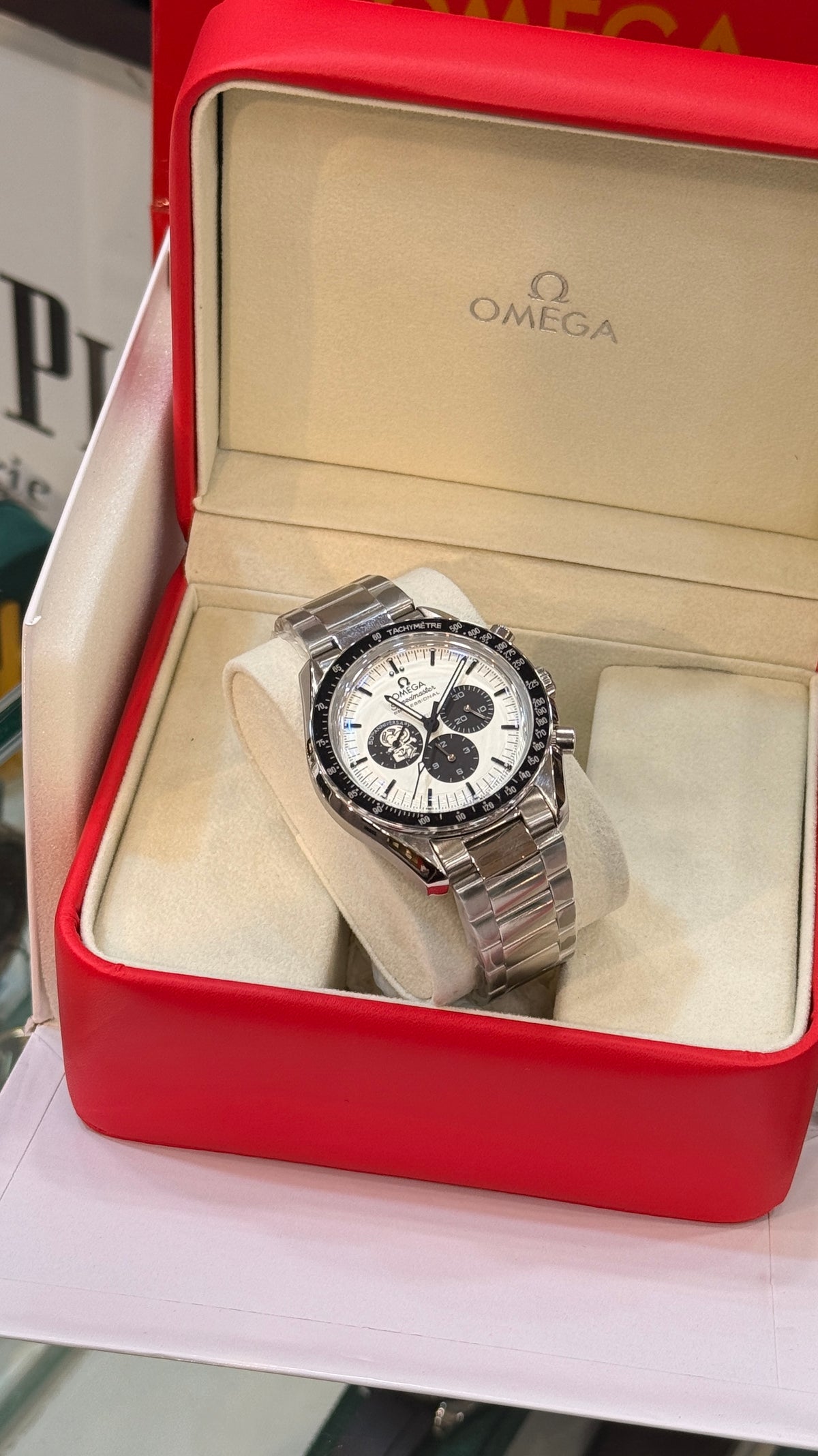 Silver with White Dial.