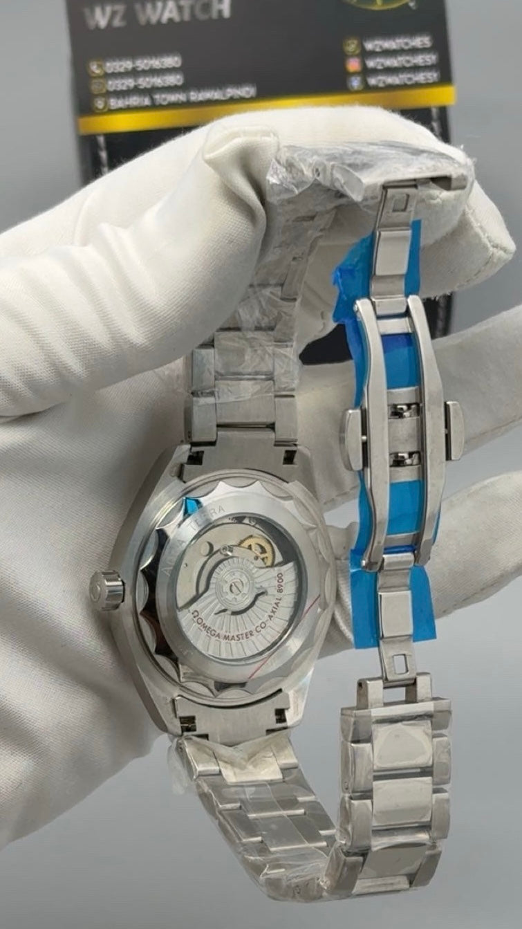Silver with black Dial.