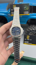 Silver with blue Dial.