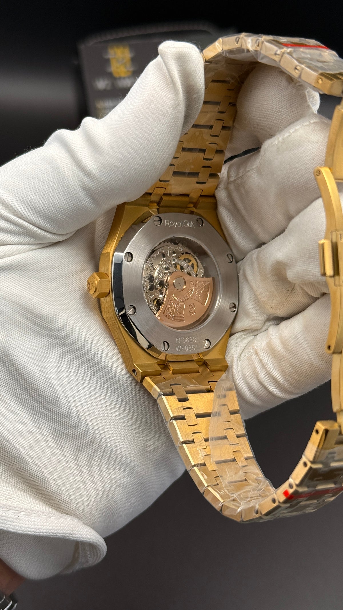 Yellow gold with blue skeleton Dial.